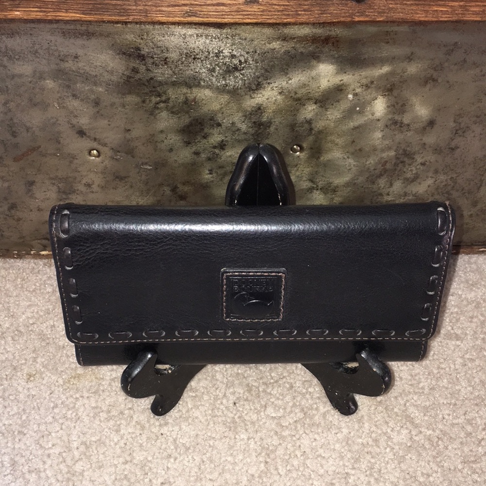 Dooney & Bourke Florentine Checkbook Organizer in black.